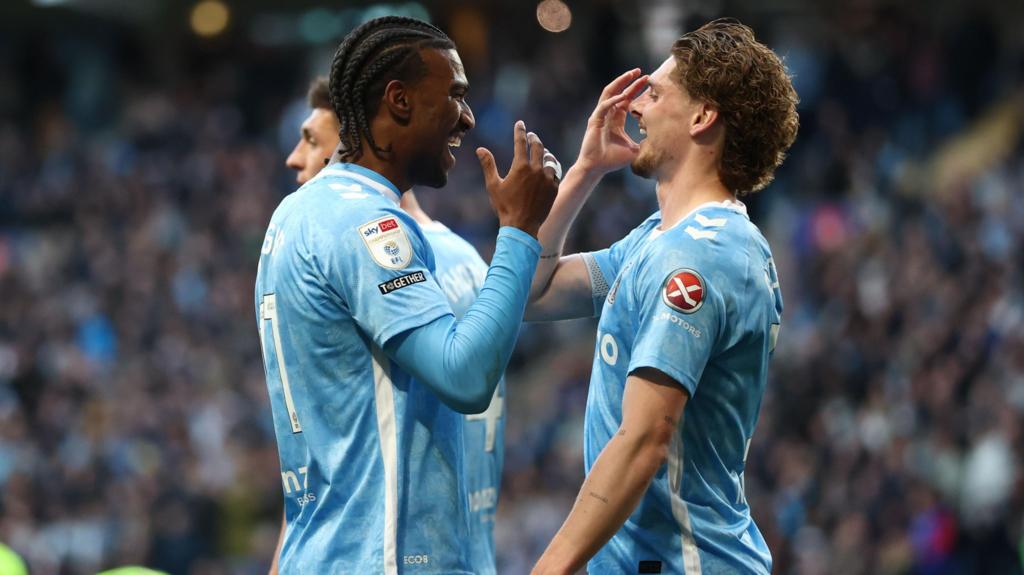 Haji Wright celebrates with Jack Rudoni