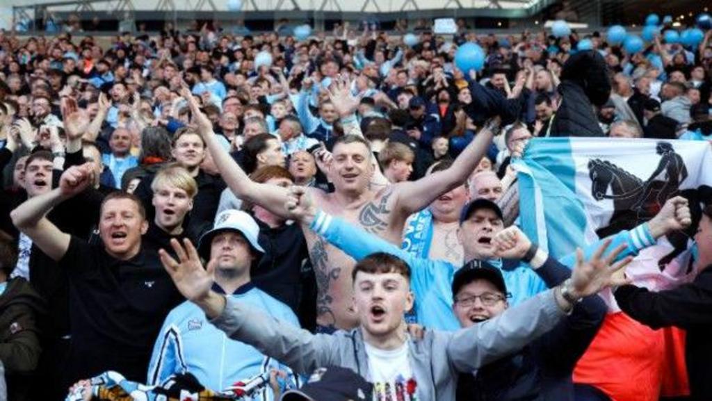 Coventry City fans hail their club after a draw with Blackburn saw the Sky Blues promoted