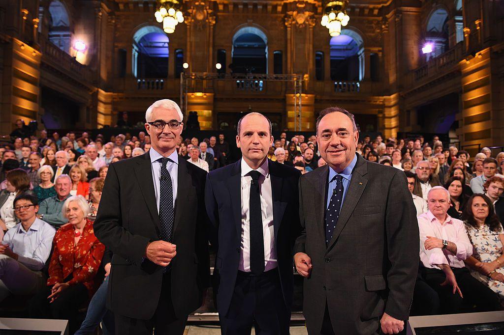 Alistair Darling, left, Glenn Campbell, centre, and Alex Salmond stand in front of an audience before a debate ahead of the Scottish independence referendum in 2014 in Kelvingrove Art Gallery, Glasgow.