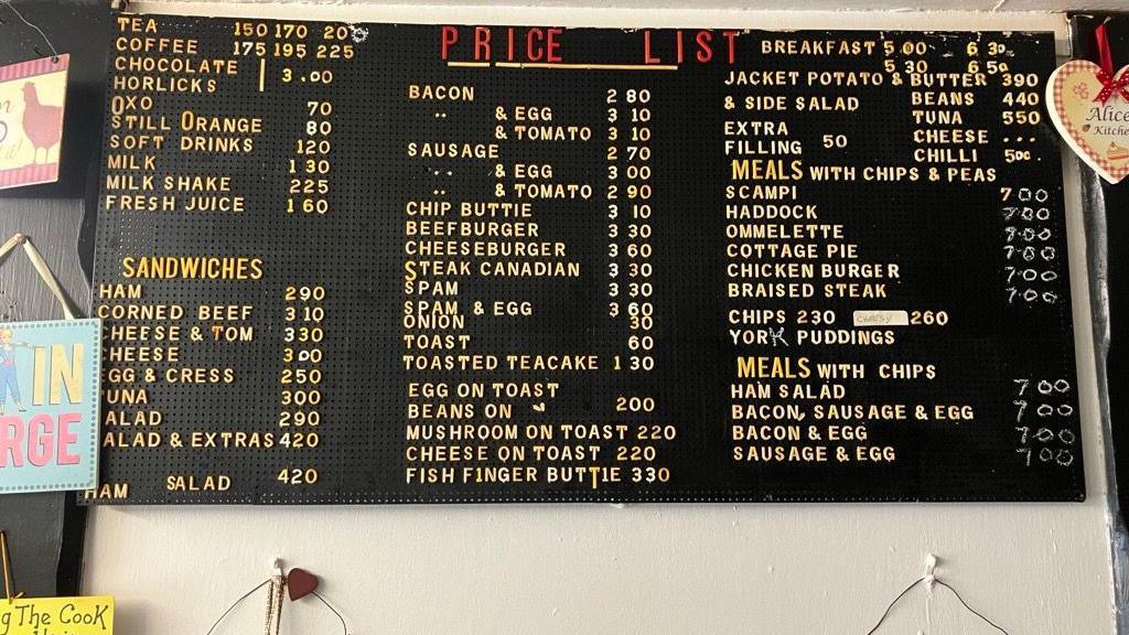 A menu board in the cafe