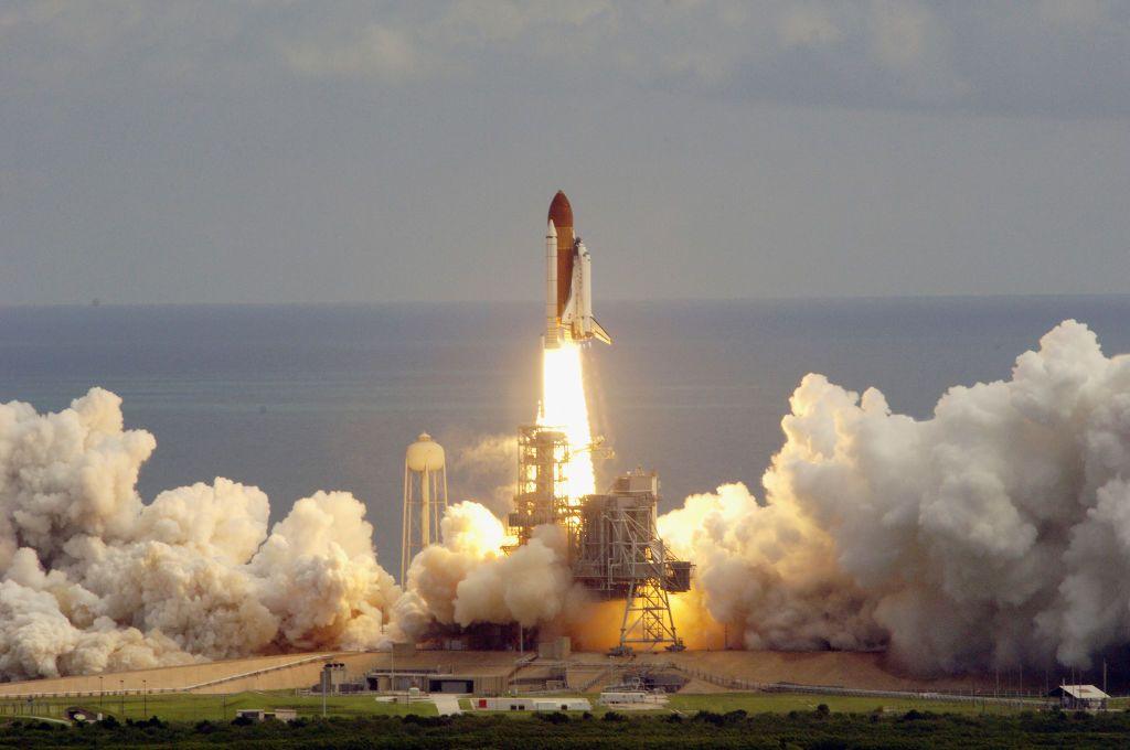 A space shuttle launches at the Kennedy Space Center, Florida.
