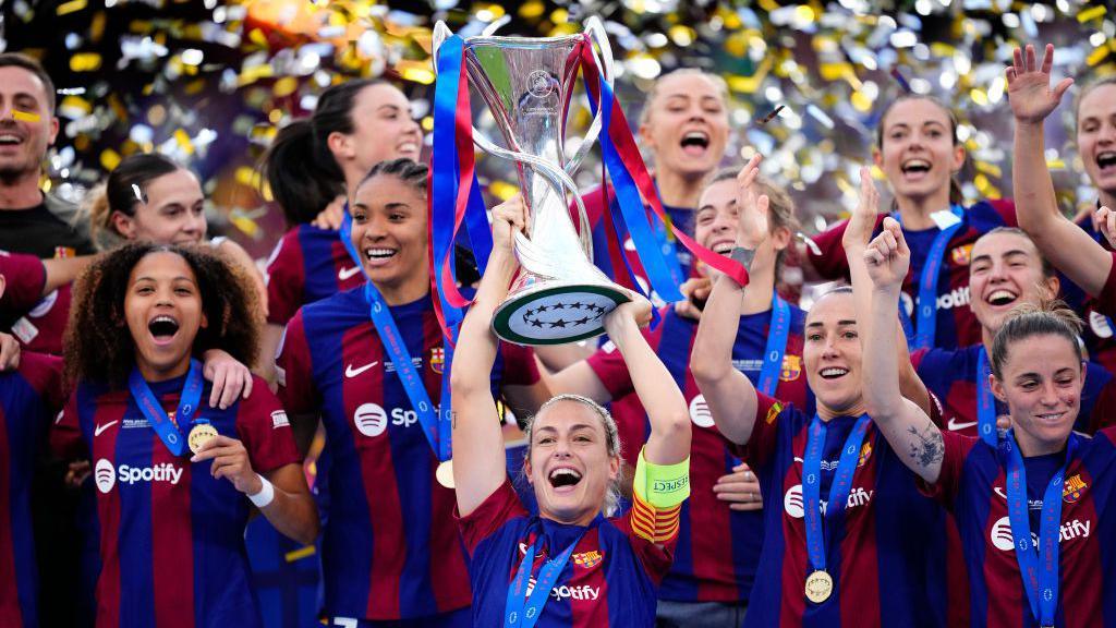 Alexia Putellas of Barcelona and Spain lifts the trophy after winning the Women's Champions League