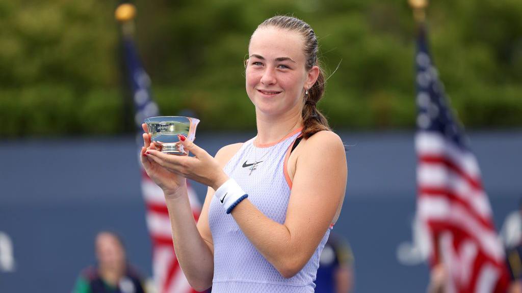 Mika Stojsavljevic with Girls' US Open trophy
