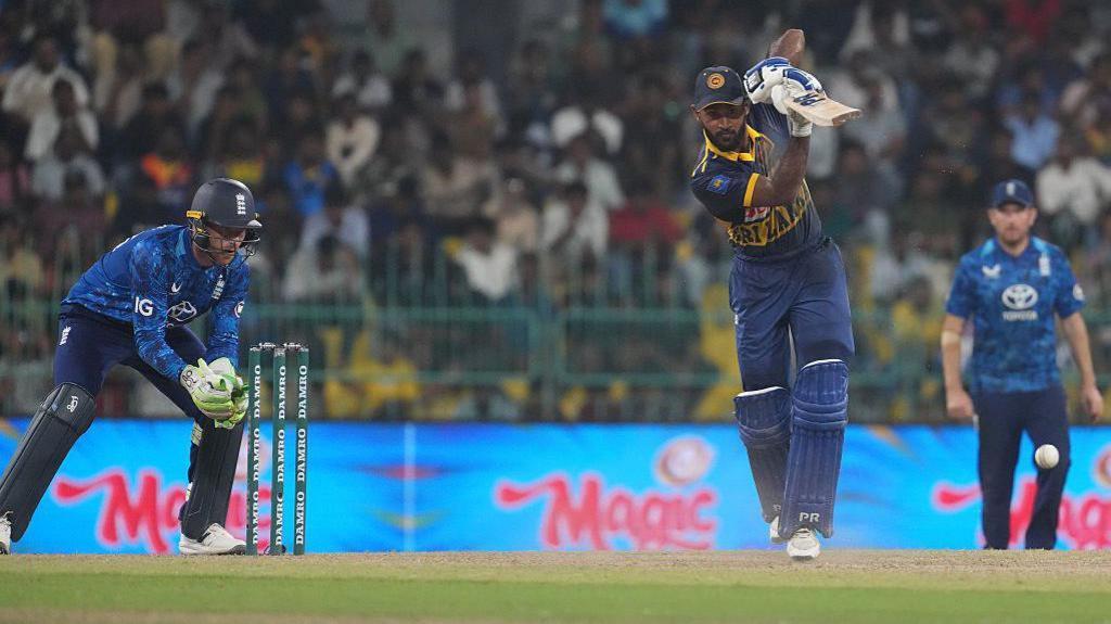 Pavan Rathnayake batting wearing a cap