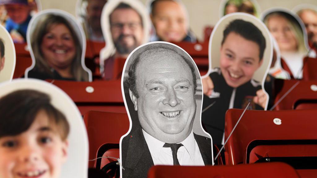 A cardboard cut-out of Graham Carr, ex-manager and current associate director of Northampton Town is seen in the stadium ahead of the Sky Bet League Two Play Off Semi-final 1st Leg match between Northampton Town and Cheltenham Town at PTS Academy Stadium on 18 June, 2020