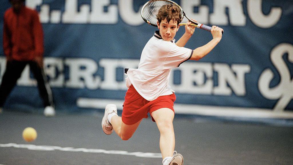 Richard Gasquet prepares to play a backhand at Le Petits As, a junior tournament, in 1999