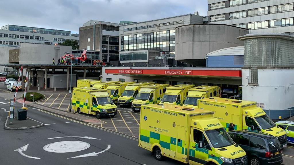 A view of the Accident and Emergency Unit at the University Hospital Wales showing ambulances parked outside the Emergency unit together with one of the Welsh Air Ambulance on October 06, 2022 in Cardiff, Wales. 