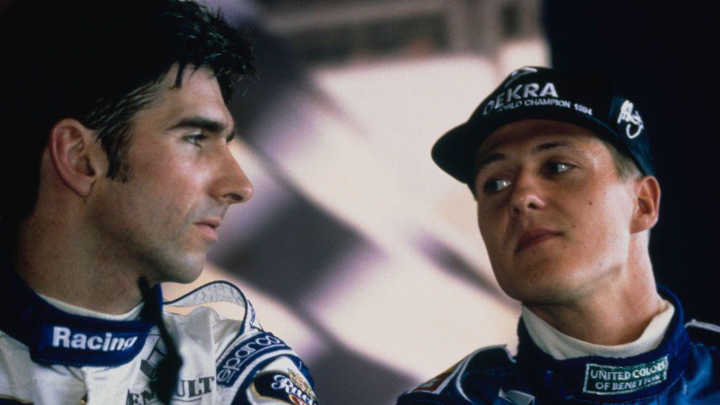 A tense look on the faces of Damon Hill and Michael Schumacher after they collided while contesting the lead in 1995. Both drivers were eliminated with Schumacher's Benetton team-mate Johnny Herbert going on to win the race