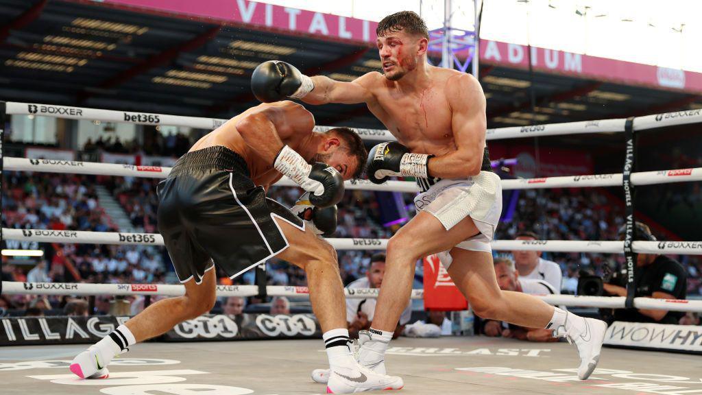 Lee Cutler and Stanley Stannard fight at AFC Bournemouth's Vitality Stadium 