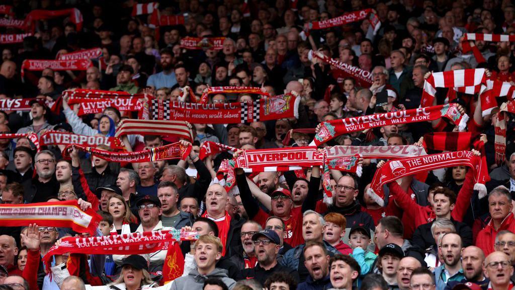 Liverpool fans show their support.
