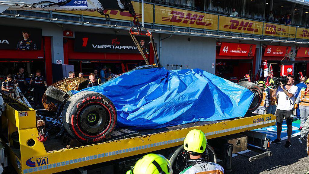 The remains of Yuki Tsunoda's Red Bull are returned to the pits after his heavy crash in qualifying for the Emilia-Romagna Grand Prix