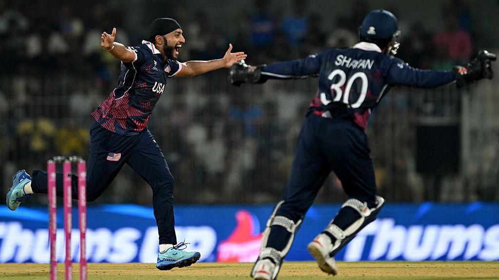 USA's Harmeet Singh spreads his arms out in celebration of taking his seventh wicket of the 2026 T20 World Cup