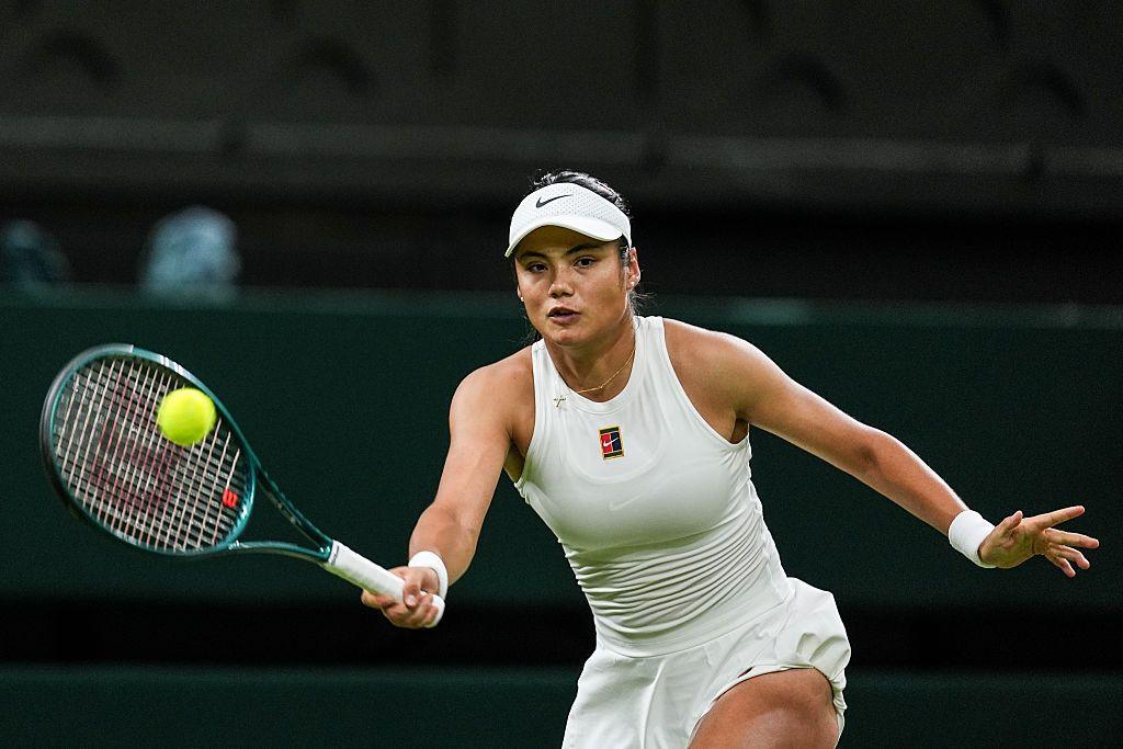 Emma Raducanu playing tennis.