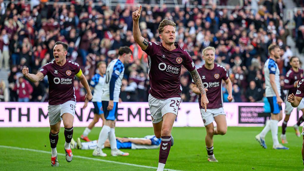 Frankie Kent celebrates after scoring the opening goal for Hearts.