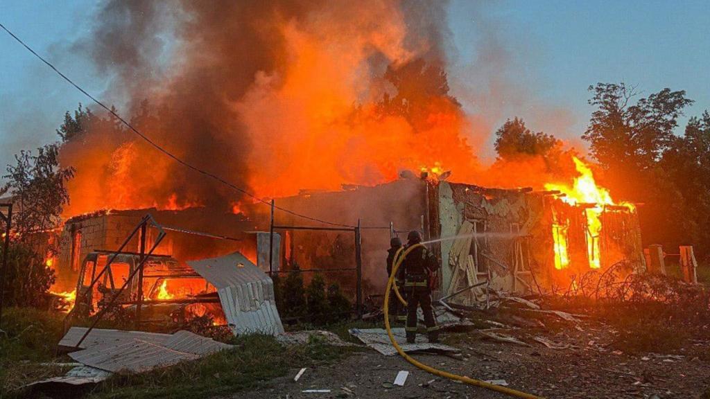 Ukrainian firefighters try to extinguish the fires following the Russian attack on Shostka community killing two people, and injuring 4 including a 7-year-old child, in Sumy, Ukraine on July 14, 2025. Civilian buildings, private houses and non-residential buildings were damaged. Emergency crews responded promptly to the scene, working to contain and extinguish the blaze.