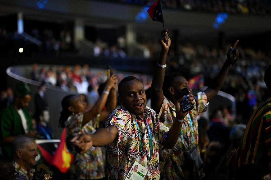 Athletes dance during opening ceremony