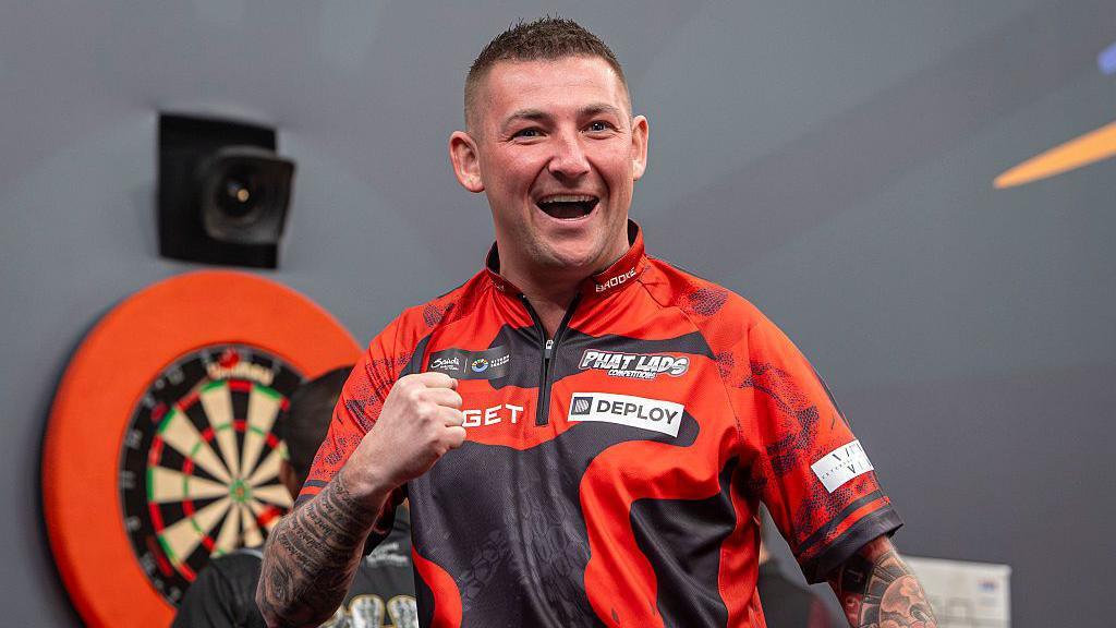 Nathan Aspinall celebrates at the Saudi Arabia Darts Masters