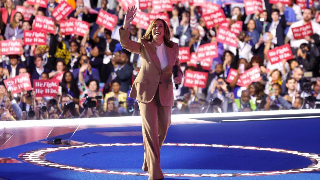 Vice-President Kamala Harris speaks onstage during the first day of the Democratic National Convention in Chicago