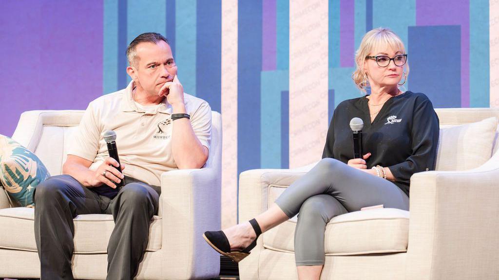 The parents of victims like Kaylee Goncalves sit on the stage during a Q&A