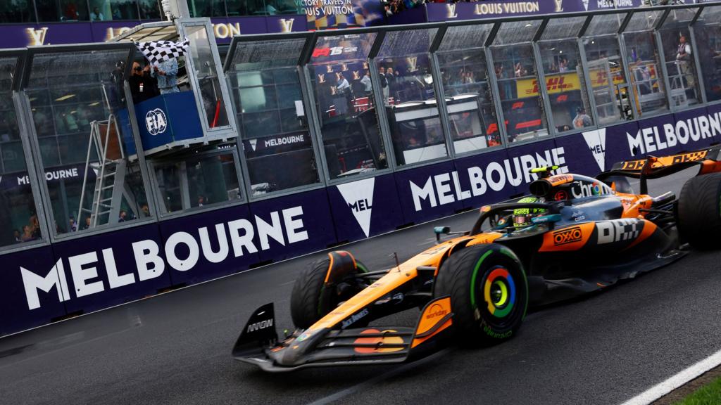 Lando Norris crosses the line to win the Australian Grand Prix