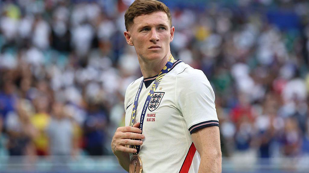 England midfielder Elliot Anderson with his bronze medal at the World Cup