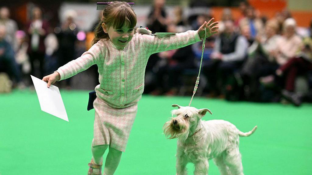 caitlyn and her dog zeeva in the show