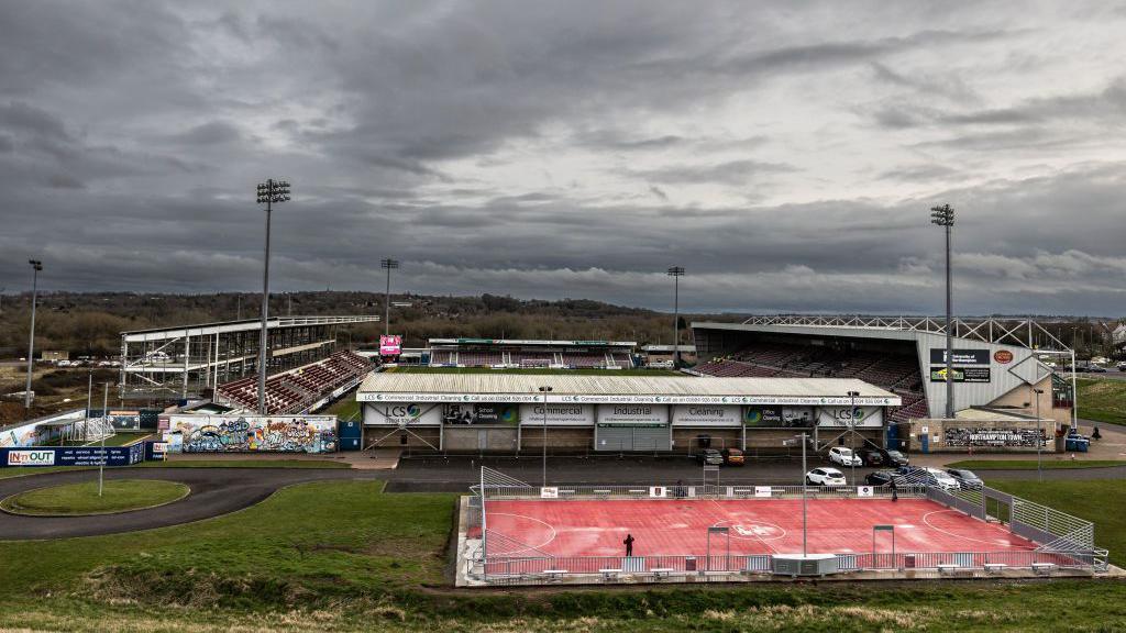 The view of outside Sixfields Stadium and the community football pitch