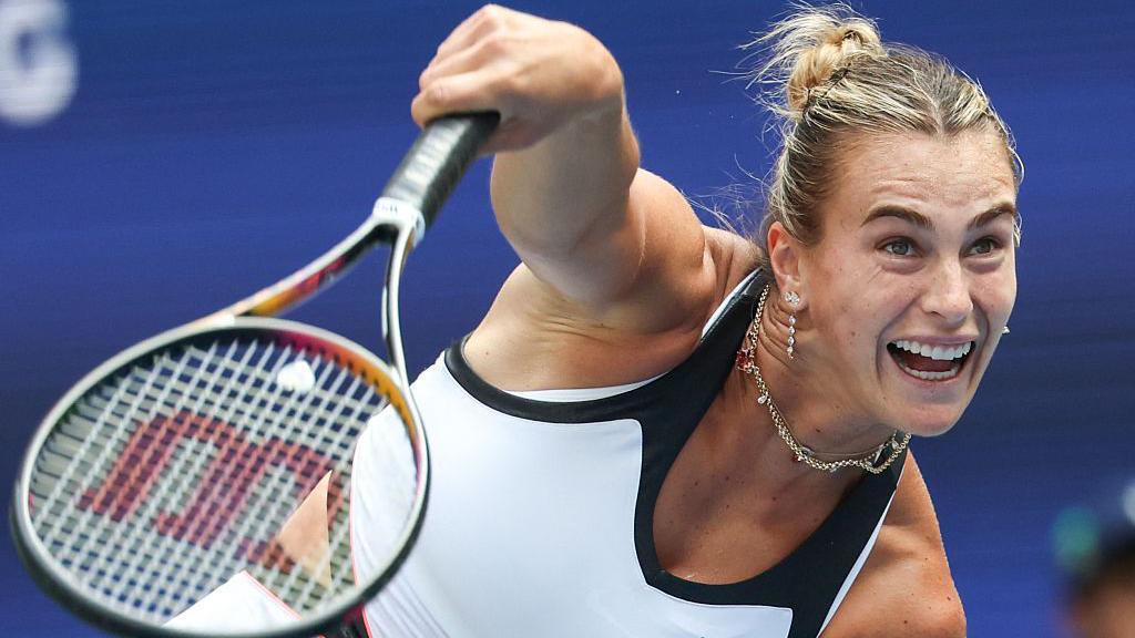 Aryna Sabalenka serves the ball during her first-round US Open match