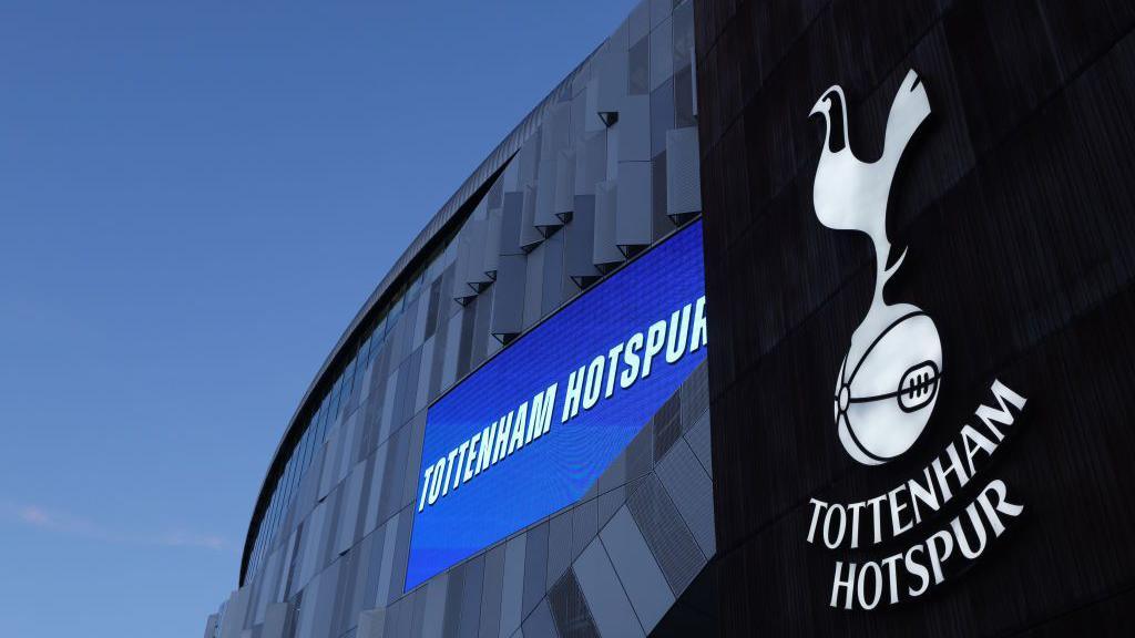 General shot of the Tottenham badge outside the Tottenham Hotspur Stadium.