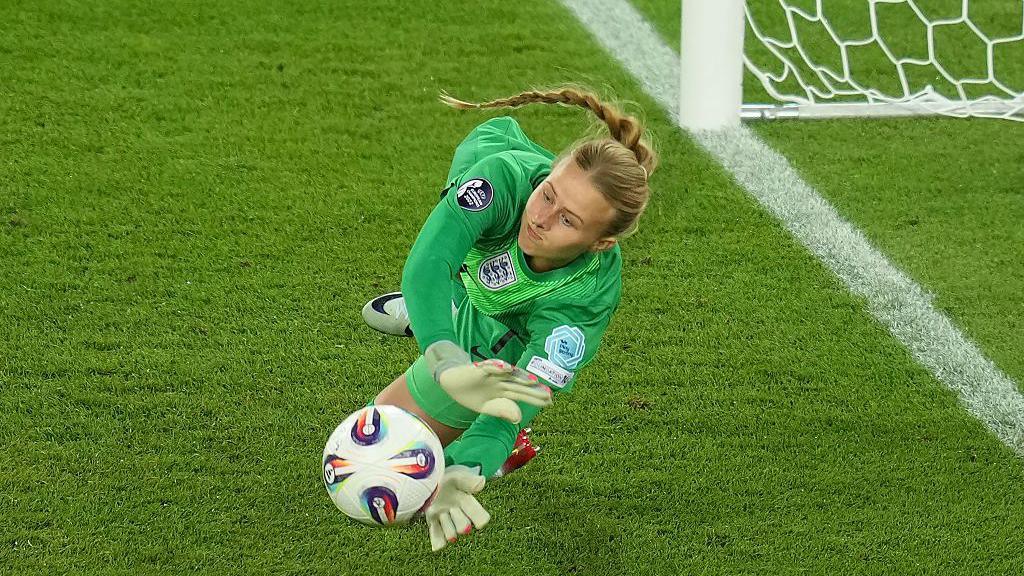 England keeper Hannah Hampton saves a penalty in the shootout against Sweden at Euro 2025