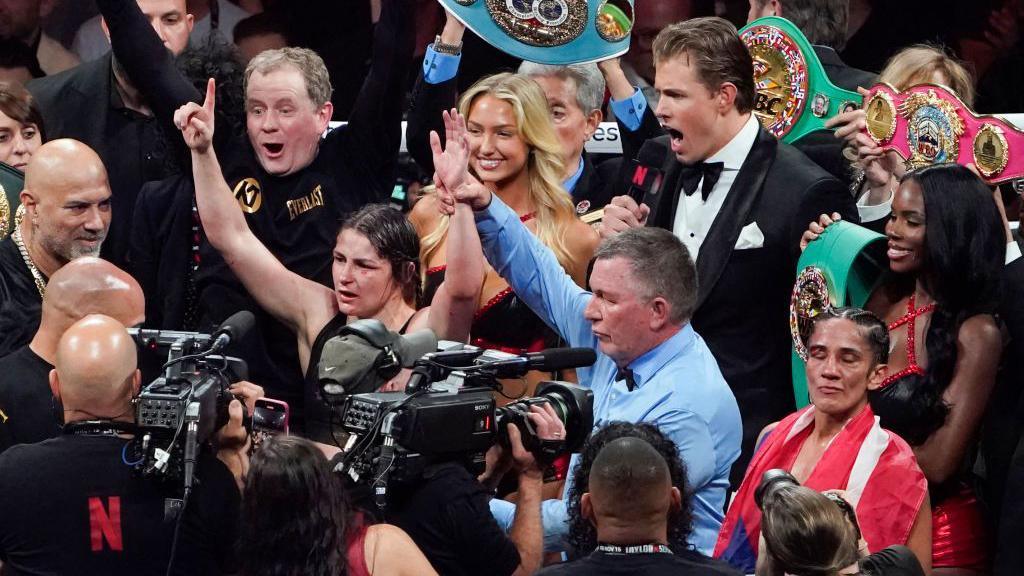 Katie Taylor celebrates as she is confirmed the winner