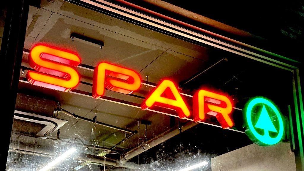 Neon SPAR sign with green logo