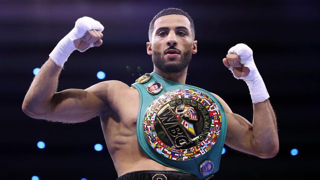Galal Yafai posing with his WBC interim title after beating Sunny Edwards