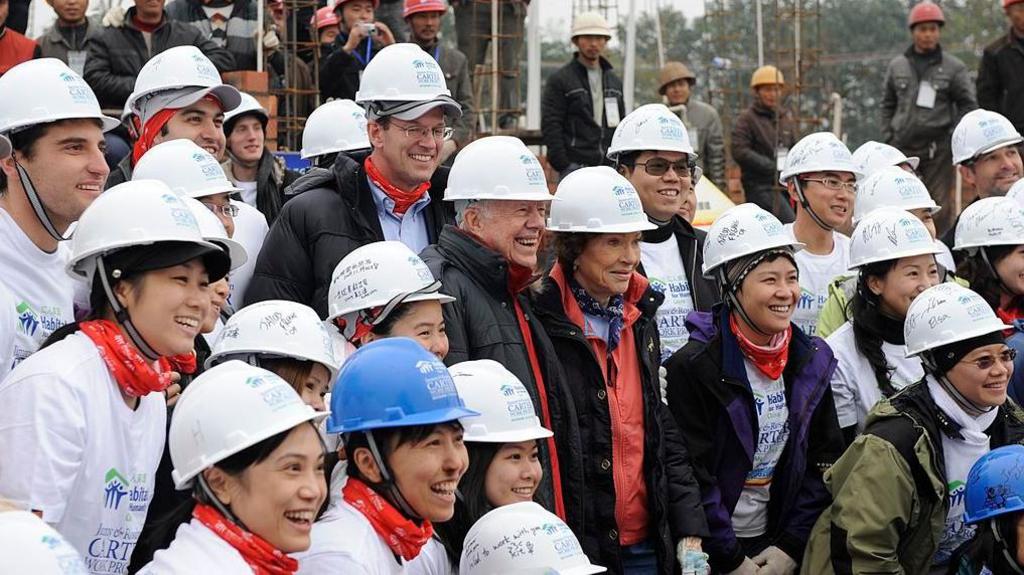 Former US President Jimmy Carter attends a Habitat for Humanity work project in Qionglai in southwest China's Sichuan province Thursday November 19, 2009.