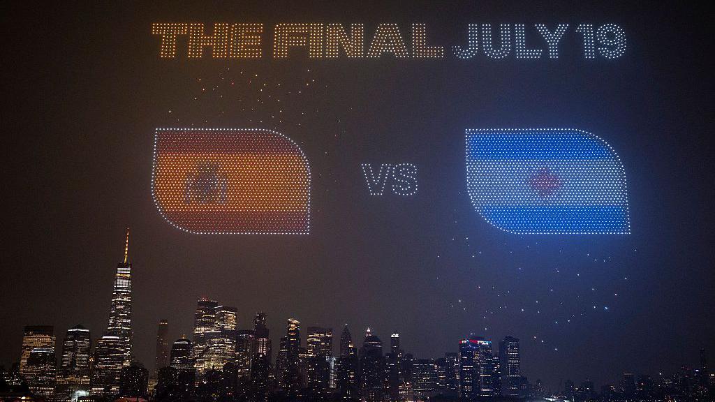 Drones light up the sky above Manhattan in the colours of the Spanish and Argentine flags with the tagline 'The Final July 19' above them