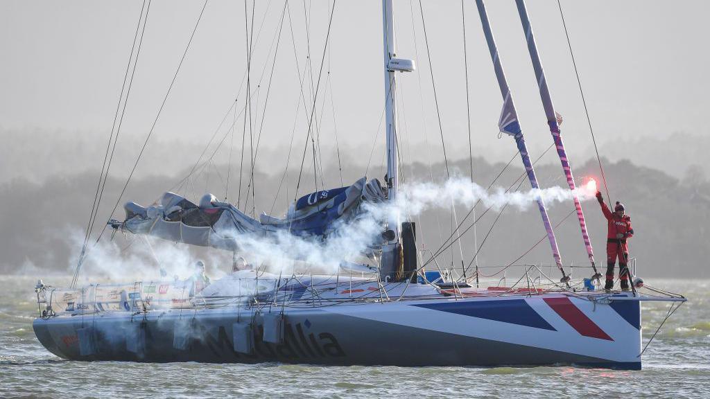 Pip Hare arrives at the quayside in Poole, England in 2021