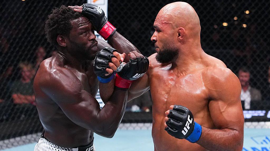 Jared Cannonier is punched by Christian Leroy Duncan