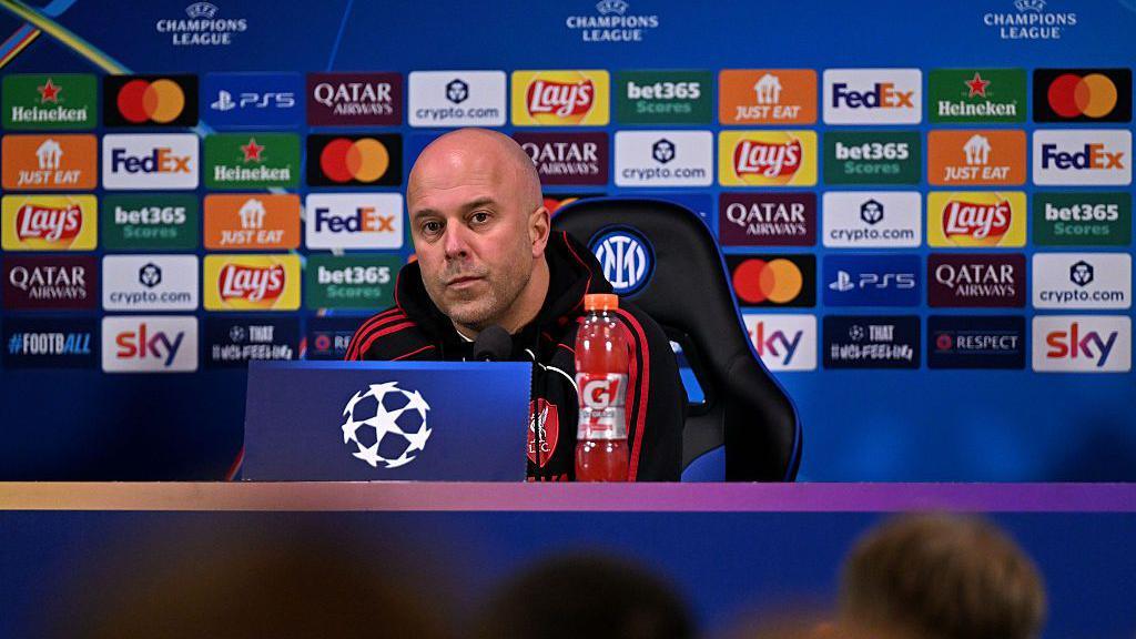 Arne Slot at a news conference