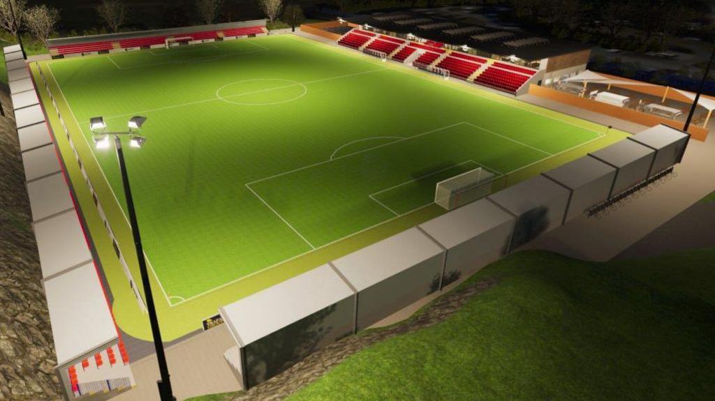 A computer generated image of a football pitch with a stand for supporters around each of the sides of the pitch. The image is set at night with flood lights in each corner of the pitch lighting it up
