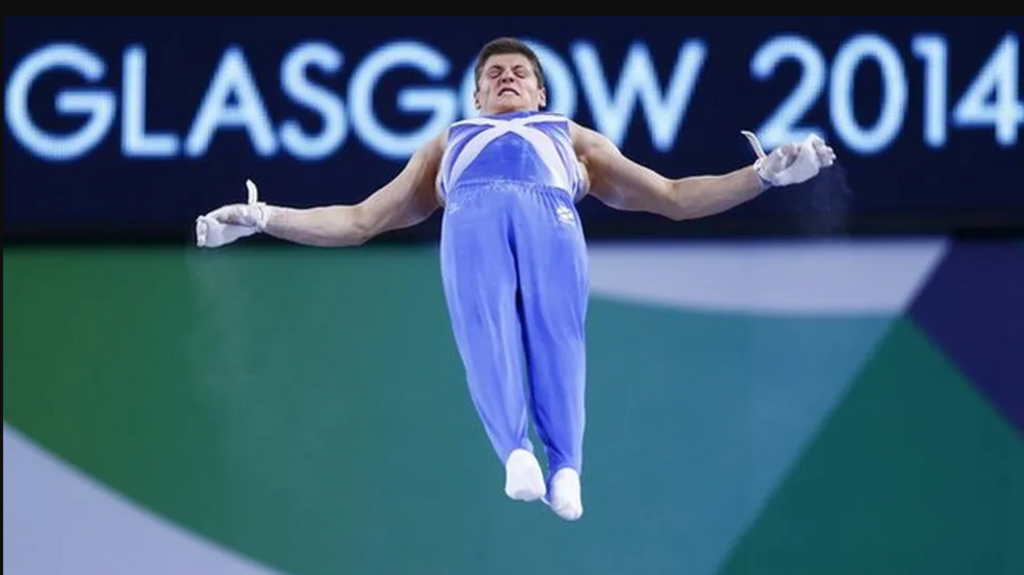 A gymnast summersaults from the rings during the 2014 Glasgow Commonwealth Games