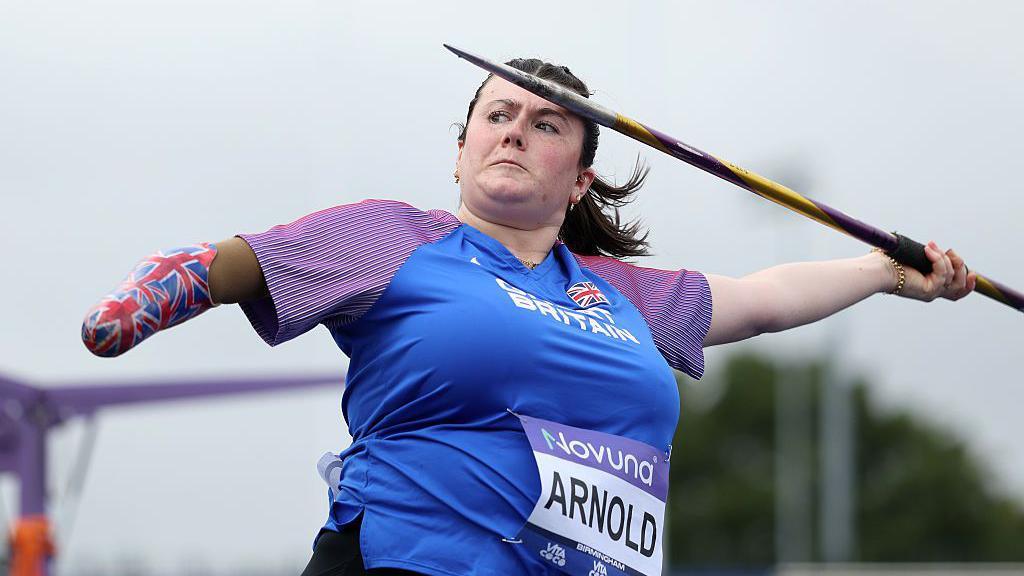 Hollie Arnold throws a javelin