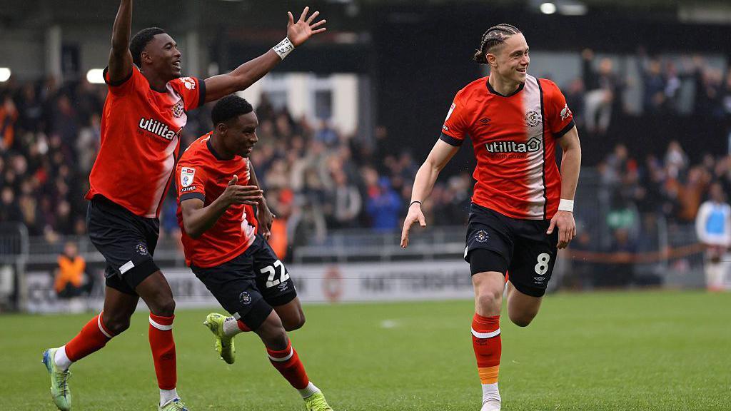 Thelo Aasgaard of Luton Town celebrates scoring for his side