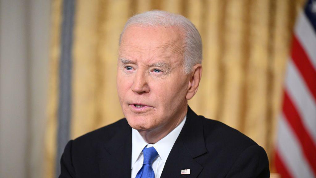 Former US President Joe Biden speaking in the Oval Office.