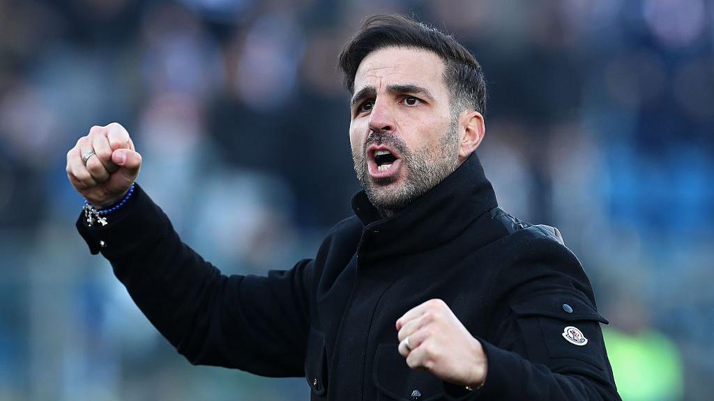 Como manager Cesc Fabregas celebrates