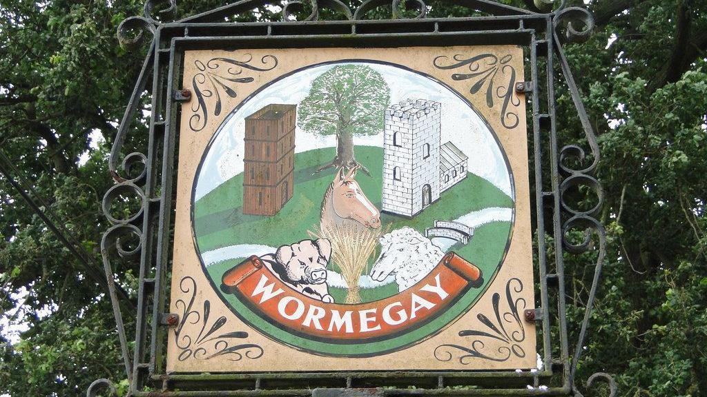 Wormegay's village sign depicts the 12th Century castle