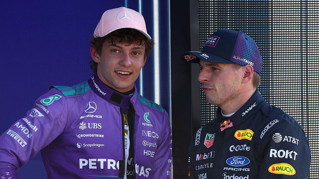 Mercedes' Kimi Antonelli and Red Bull's Max Verstappen have a chat after the qualifying session