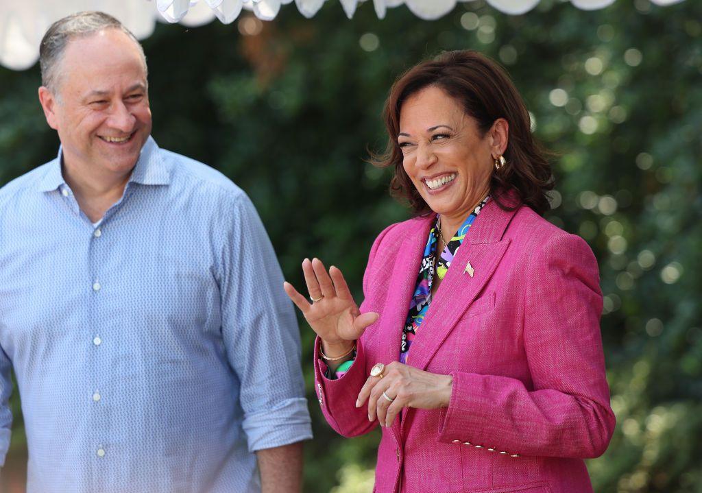 Doug Emhoff and Kamala Harris smile