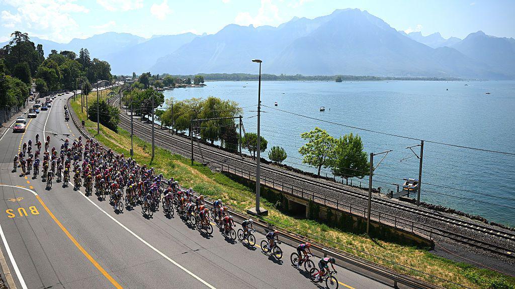 A general view of the peloton passing through a Montreux landscape