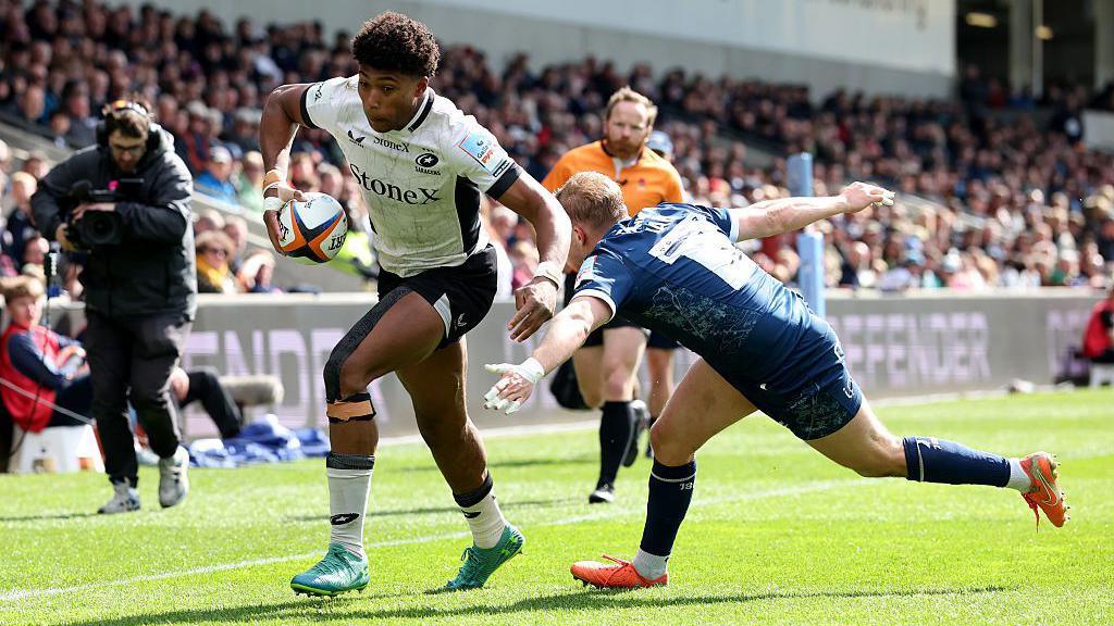 Noah Caluori of Saracens scores his team's sixth try during the Gallagher PREM match between Sale Sharks and Saracens at CorpAcq Stadium.