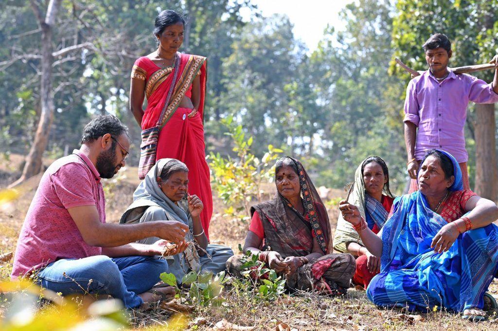 Alok and tribespeople